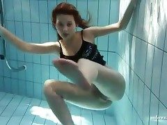 Sheer pantyhose are all sopping in the sky girl in pool