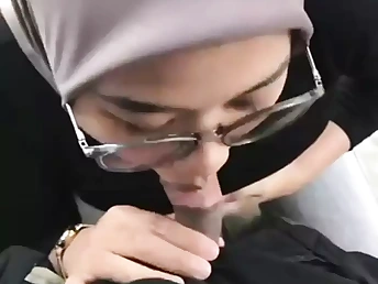 Malaysian honey Awek Tudung takes on her boy's rigid knob in a red-hot rear end-fashion sesh